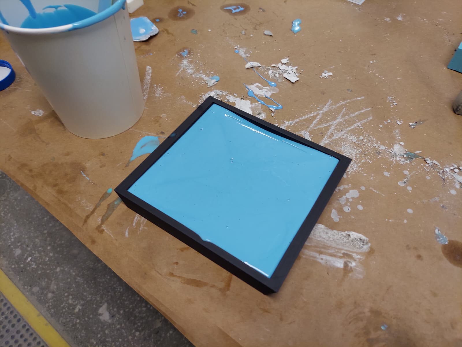 Close-up of freshly poured blue silicone surface